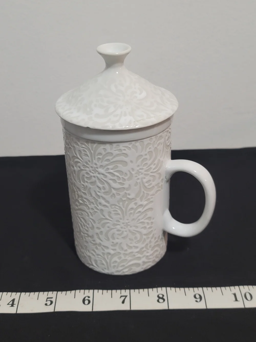 Cost Plus World Market White Embossed Ceramic Tea Strainer Mug with Lid